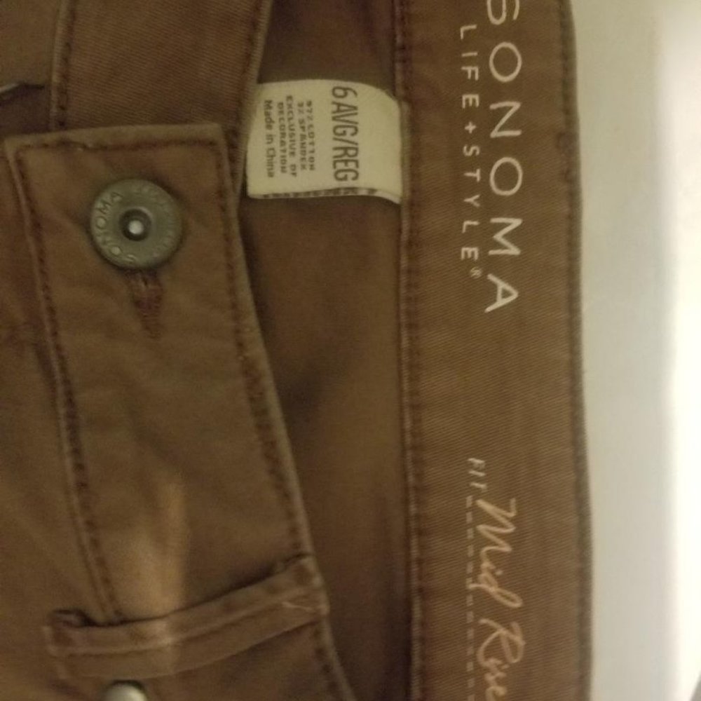 Brown hipster denim pants (not blue jeans)